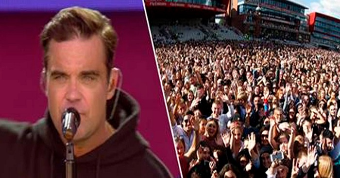 Robbie Williams sjunger ”Angels” för att hylla terroroffren – se när 50.000 personer sjunger med honom!